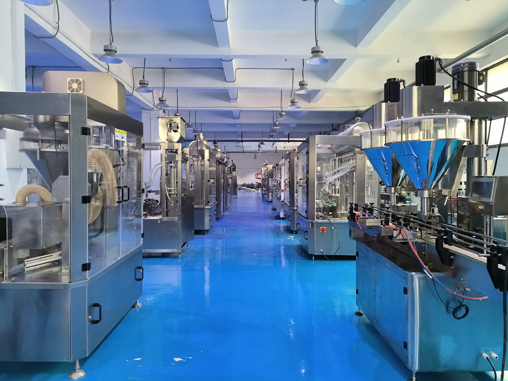 全自動粉劑灌裝機(jī)、液體灌裝機(jī)車間